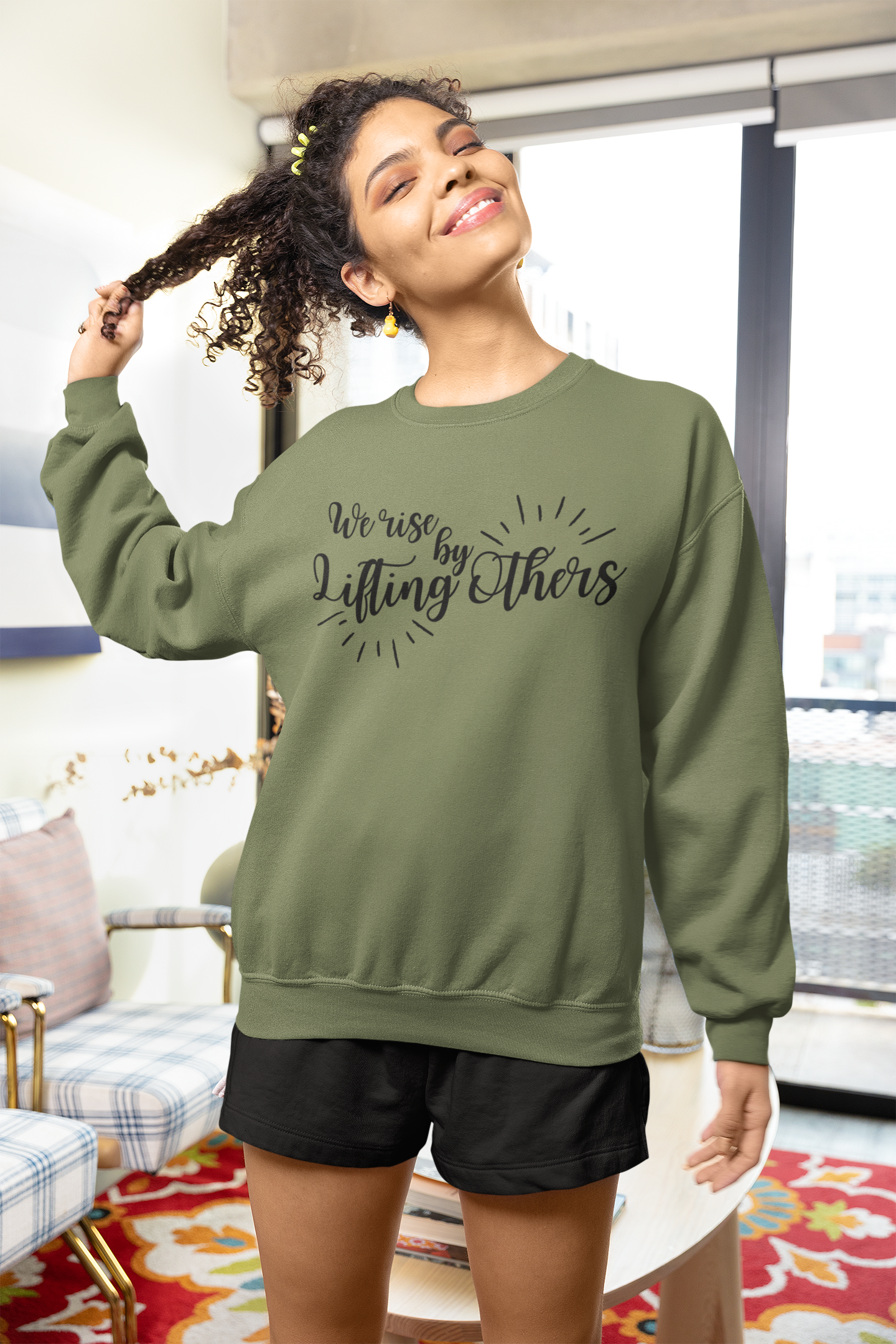 WE RISE BY LIFTING OTHERS Adult Unisex Sweatshirt